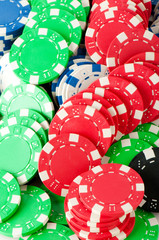 Stack of various casino chips - gambling concept