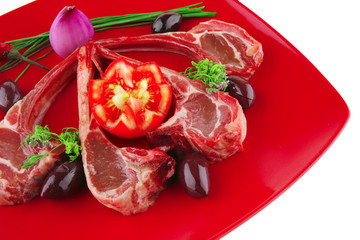 image of ribs served on red