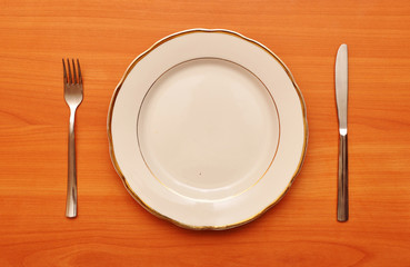 empty plate with fork knife