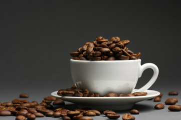 Coffee beans in cup