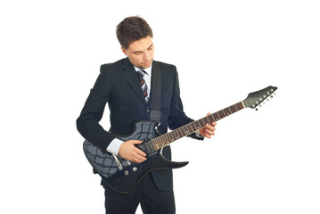 Handsome businessmanwith guitar