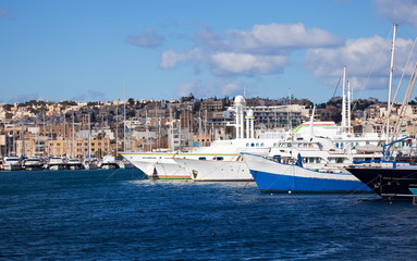 Fototapeta na wymiar Yachts lying at Marsamxett harbour