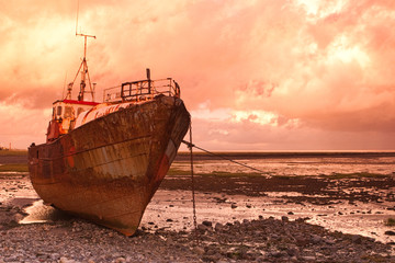 Dead trawler on the beach in Great Britain