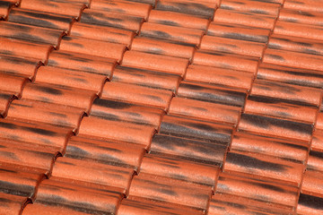 Old terracotta tile roof, detailed structure view at an angle