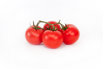 Fresh tomatoes on the white