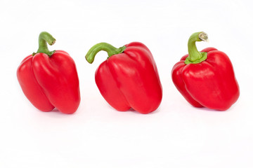 three peppers isolated on white background