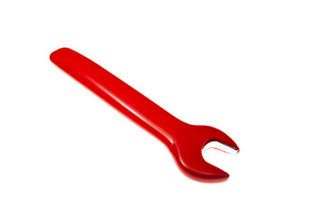 Red adjustable spanner..