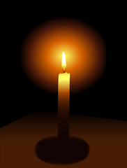 Candle on a dark background