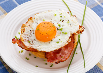 Breakfast - fried egg with bacon