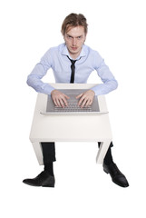 Young businessman, office worker or student with laptop