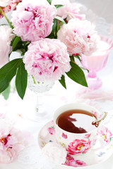 pink peonies and cup of tea