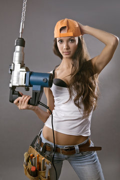 sexy young woman construction worker