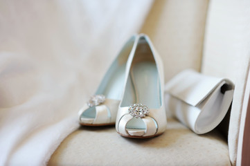 Elegant bridal shoes and a handbag