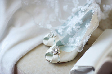 Elegant bridal shoes and a veil