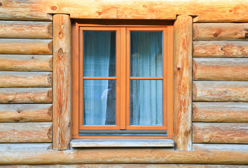 Obraz na płótnie Canvas modern window in wood house