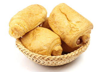 pasties with sausages in wattled basket