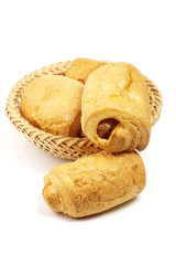 pasties with sausages in wattled basket