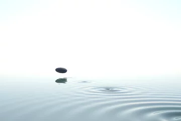 Foto op Canvas Zen stone thrown on the water © dampoint