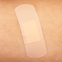 Sticking plaster on a skin