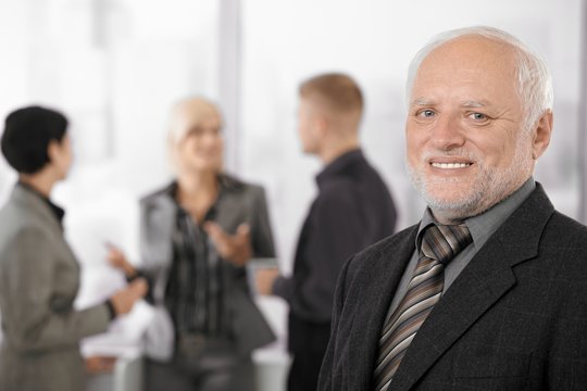 Portrait of senior businessman smiling