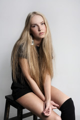Naklejka premium attractive beautiful girl posing in studio