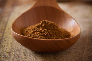 Cinnamon in a pile of wooden spoon