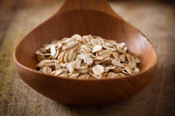 Cereal in a wooden spoon