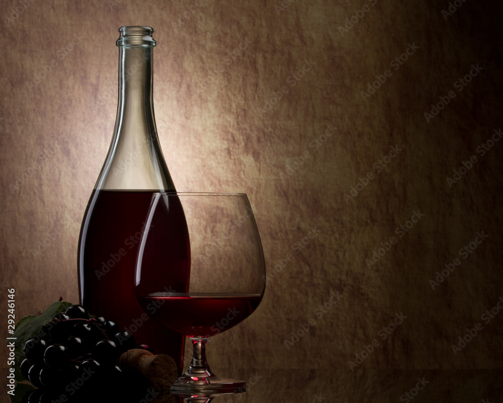 Poster bottle with red wine and glass and grapes