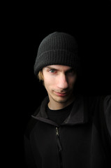 Young male in darkness
