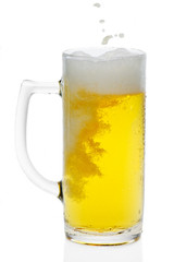 Glass of beer on white