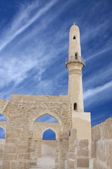 Fototapeta na wymiar Archway and a minaret of Khamis mosque, Bahrain