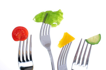 Vegetables on the forks.