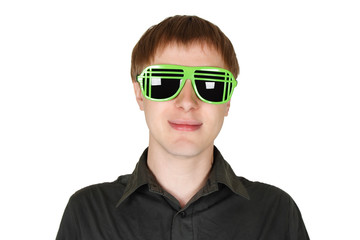young man in modern club sunglasses smiling isolated