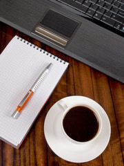Laptop and cup