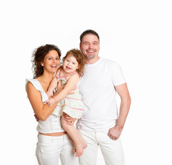 mother, father and their child together in studio