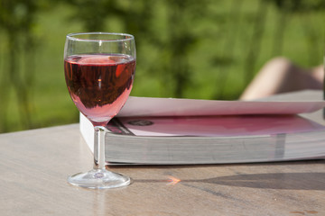 Still life of wine and book