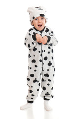 Little boy   dressed in a Dalmatian  suit.