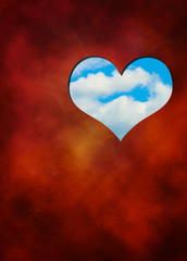 The cut out in red hearts against blue sky