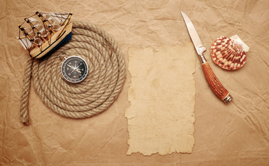 adventure decoration with compass on old paper