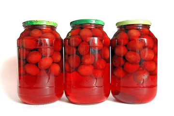 canned plum on white background
