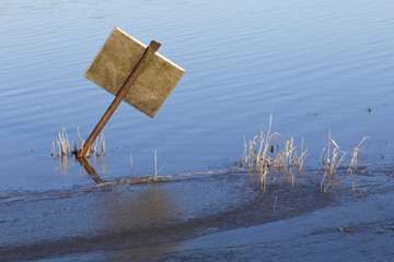 sign post in flood water