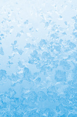 Light blue frozen window glass