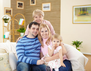 Fototapeta premium grandmother with her family at home