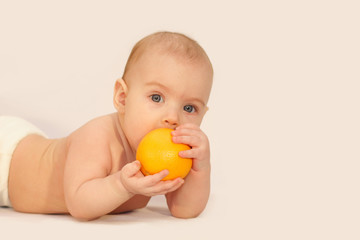 baby with an orange