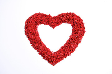 Red heart with sand