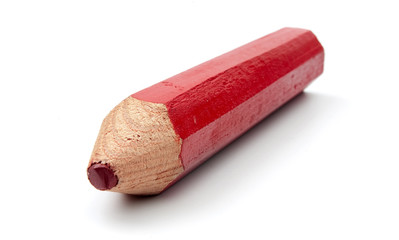 red pencil on a  white background