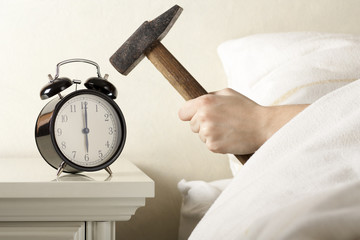 Smashing Alarm Clock with Hammer