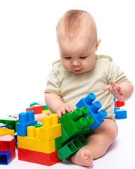 Little boy with building bricks