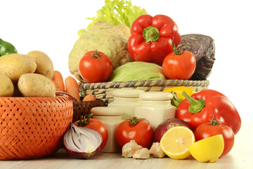 Composition with variety of raw vegetables isolated on white