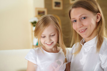 mother with teenager daughter at home